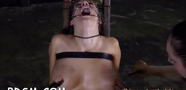  Restrained slave receives lusty torture for her wicked twat
